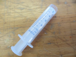 Tip-less syringe to be filled with sediment