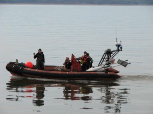 Monitoring the ice drifters with a small boat.